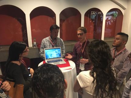 NDItech trainer talks DemTools with participants at TechCamp Guatemala